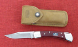Buck 0110CWSNK 110 Folding Hunter Knife Chairman Series Chuck Buck Signature Cherrywood Dymondwood USA Lot#110-223