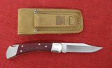 Buck 0110CWSNK 110 Folding Hunter Knife Chairman Series Chuck Buck Signature Cherrywood Dymondwood USA Lot#110-223