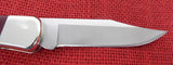 Buck 0110CWSNK 110 Folding Hunter Knife Chairman Series Chuck Buck Signature Cherrywood Dymondwood USA Lot#110-223