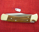 Buck 0110 110SP17 110 Folding Hunter Tribute Wyatt Earp Gold Etched Oak Handle Lockback Knife USA Made 2001 Lot#110-139