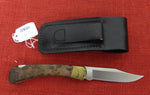 Buck 0110RESLE 110 Folding Hunter Knife Boone & Crockett Redwood Burl Lot#110-231
