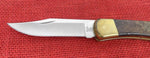 Buck 0110RESLE 110 Folding Hunter Knife Boone & Crockett Redwood Burl Lot#110-231