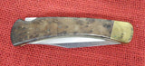 Buck 0110RESLE 110 Folding Hunter Knife Boone & Crockett Redwood Burl Lot#110-231