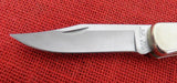 Buck 0110-Sample 110 Folding Hunter Burlwood 50th Anniversary Nickel SIlver 110-288