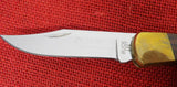 Buck 0110-BY 110 Folding Hunter Brian Yellowhorse 25 Year Commerative 110-284