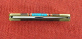 Buck 0110-BY 110 Folding Hunter Brian Yellowhorse 25 Year Commerative 110-284