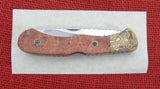 Buck 0532APSLE1 532 Bucklock Knife Apple Coral Mokume Bolsters USA 532-56