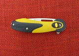 Buck 0766YWS 766 Revel SafeSpin Knife Yellow GRN Button Lock BU-574